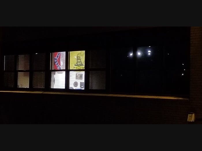 Photos of a Confederate and “Don’t tread on me” flag on display at a Levittown Fire Department station in Bethpage.
