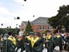  Ward Melville High School graduates throwing their caps in the air as they were announced alumni of the Three Village School District.

