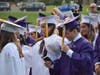Earl L. Vandermeulen High School’s Class of 2021 move their tassels at graduation last Friday.