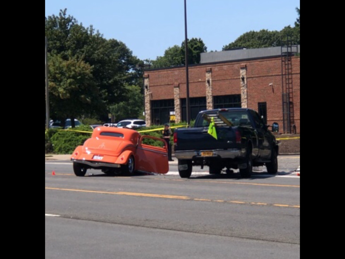Detectives are investigating a two-vehicle crash that killed a man in Miller Place on Saturday morning, Suffolk Count​y police said.