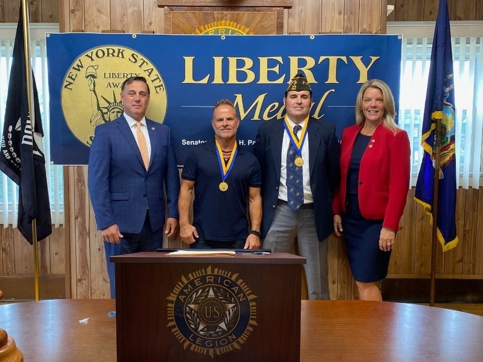 Two good Samaritans were awarded the state's highest civilian honor — the Liberty Medal — during a special ceremony in Patchogue on Wednesday.