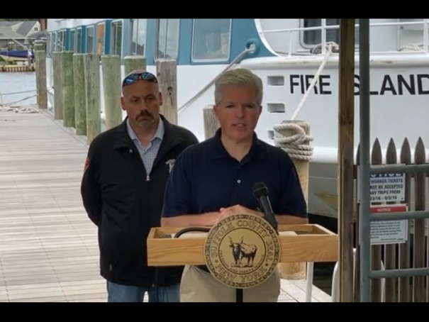 Suffolk County Executive Steve Bellone and Fire, Rescue and Emergency Services’ Commissioner John Jordan at a press briefing in Bay Shore on Saturday.