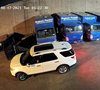 The pair drove away in a white Ford Explorer with no front license plate, police said. 