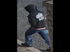 His jacket had white writing on the back.