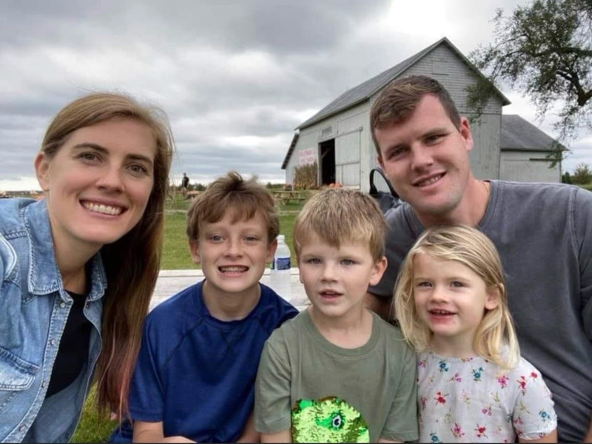 Suffolk police office Timothy Thrane and his family on a recent outing to a farm.
