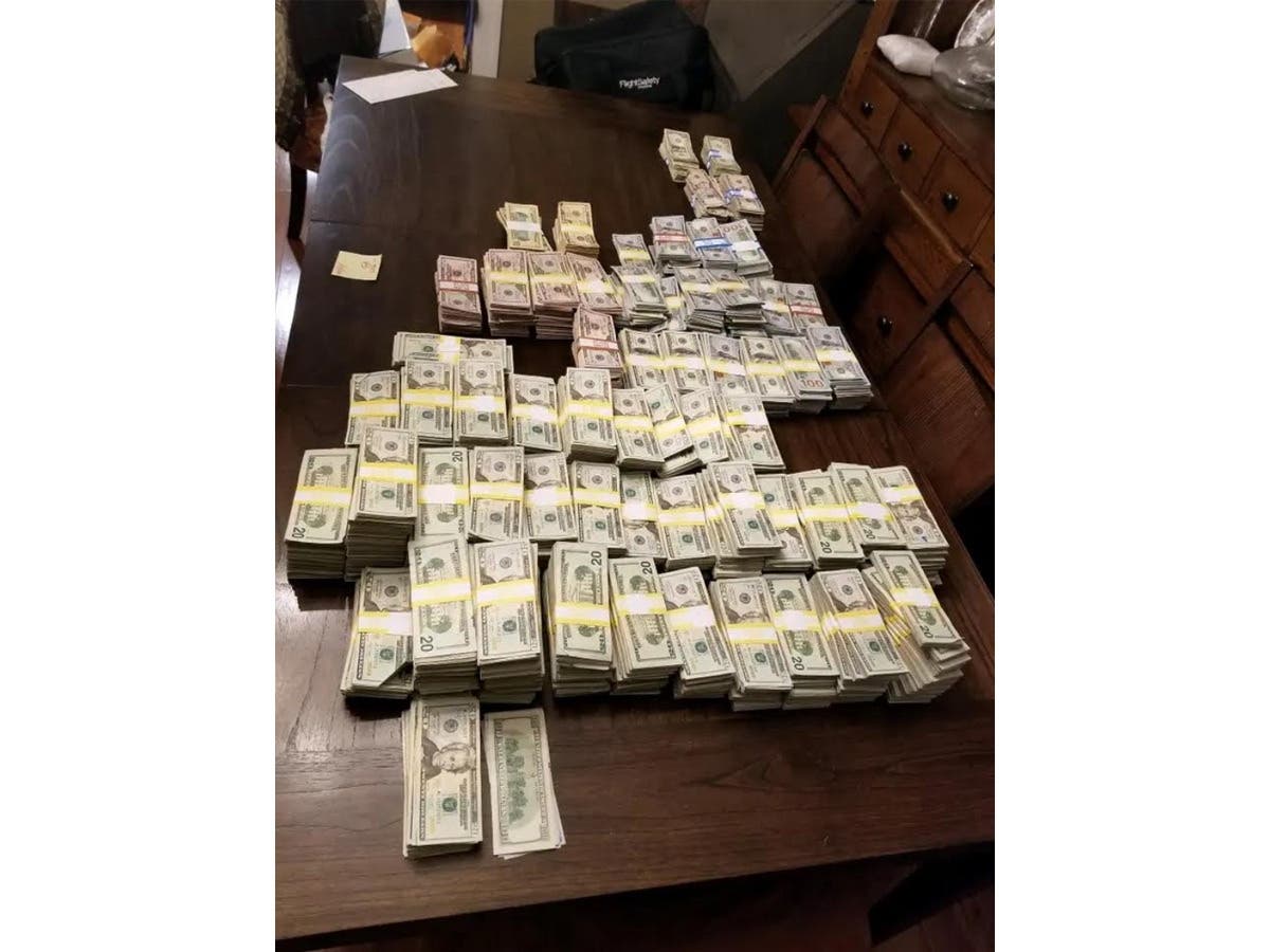 About $900,000 in cash was seized last week following an investigation into a COVID-19 vaccination card scam, Suffolk Distict Attorney Ray Tierney's office said.