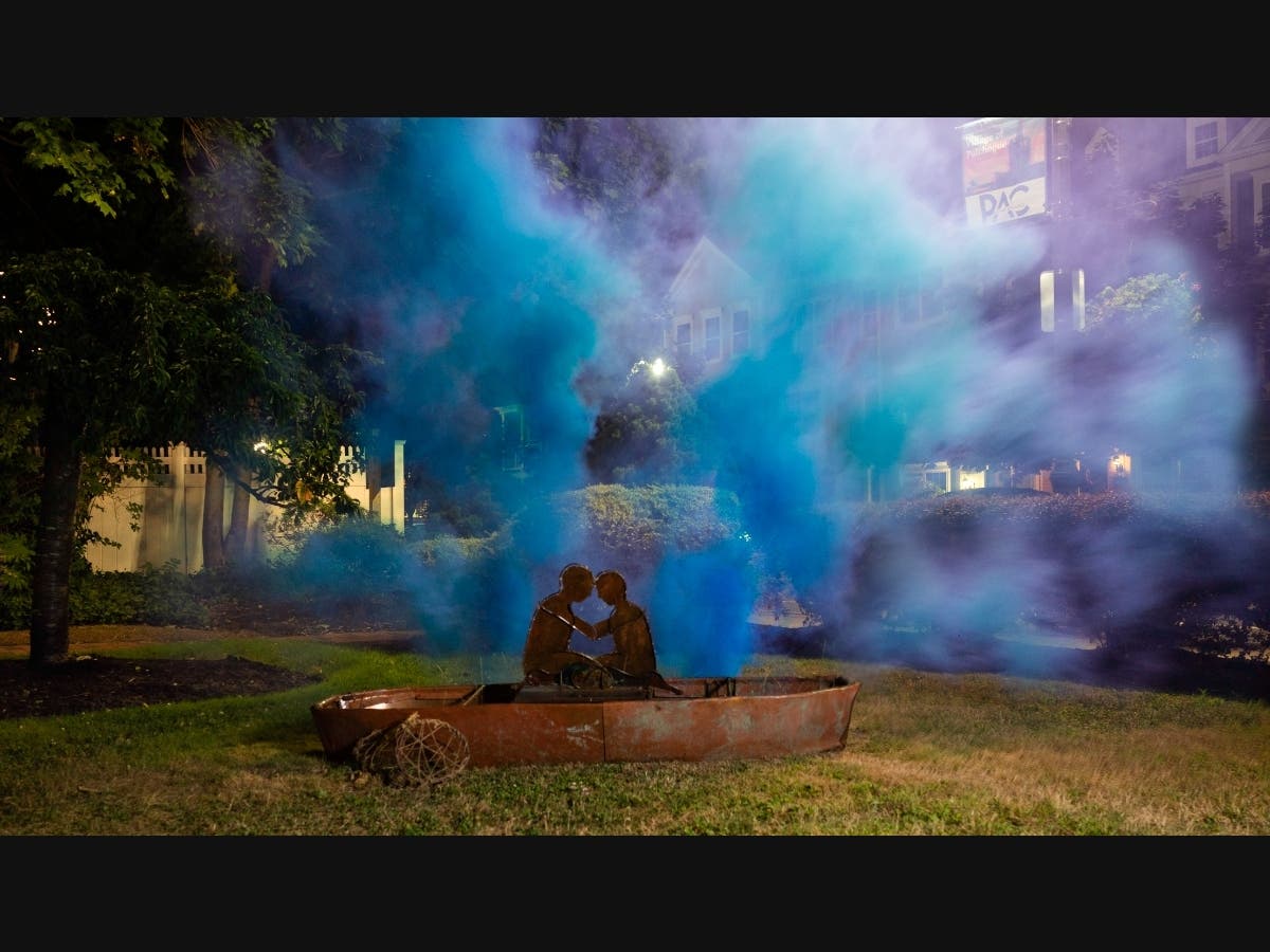 The centerpiece of a temporary art installation featuring a man and woman on a canoe was stolen from a Patchogue street corner.