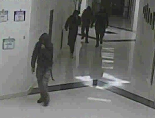 Suffolk police say four males broke into John S. Hobart School in Shirley and scrawled hateful and sexual graffiti on a classroom wall in September.