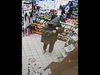 Two men went inside the Route 112 business just before 11 p.m. on Dec. 12, and one waived what appeared to be a knife at a clerk while demanding cash from the register, police said.