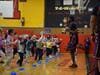 Students took part in basketball tricks and fitness warm-ups with the Wizards.