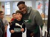 Greg Senat signed autographs for the 5th graders.