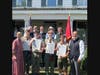 Troop 64 served as the color guard and led the Pledge of Allegiance.
