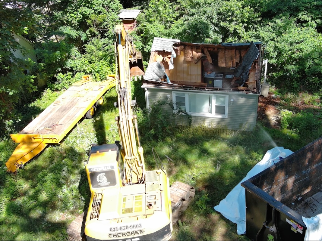 A long-standing blighted home in Rocky Point that Brookhaven officials say negatively impacted the surrounding community was demolished last month.