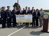 He was joined by County Executive Ed Romaine, Police Commissioner Kevin Catalina, Undersheriff John Becker, and local officials for the check presentations at the police department's headquarters.