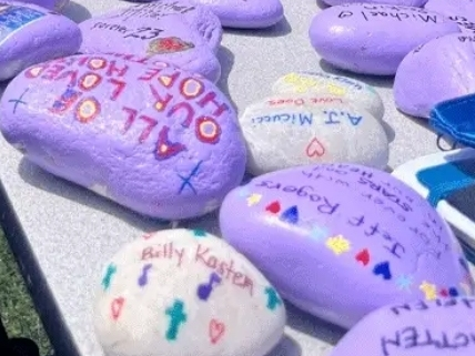A group of Long Island parents
and residents of Hope House in Mount Sinai will be turning grief into grace, one purple rock at a time on Wednesday.