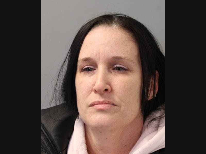 A Mastic woman was sentenced to eight months in jail after violating the conditions of her three-year probation in connection her pitbull mauling a toddler and his uncle outside her home, Suffolk District Attorney Ray Tierney said Thursday.