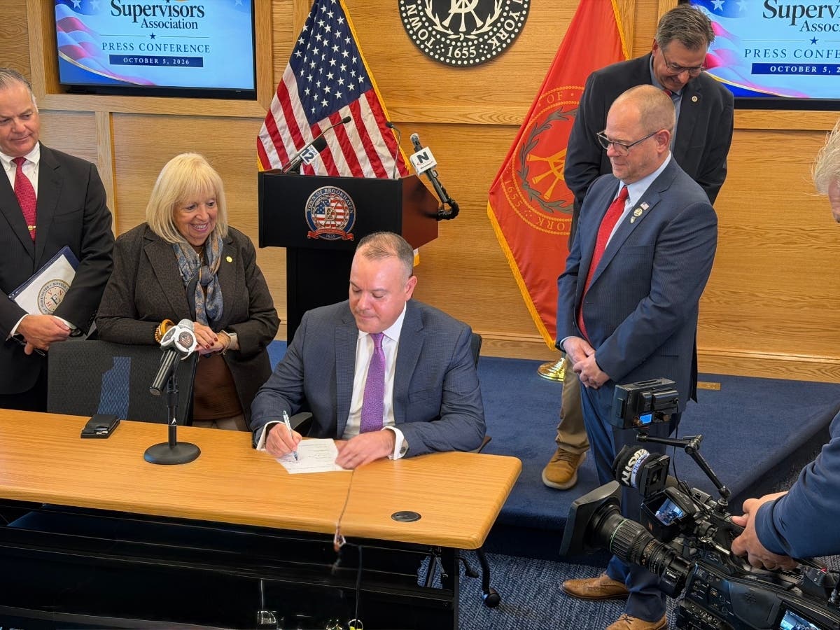 Suffolk County's town supervisors called on Albany on Monday to address unfunded mandates and property tax pressures at a news conference at Brookhaven Town Hall in Farmingville.
