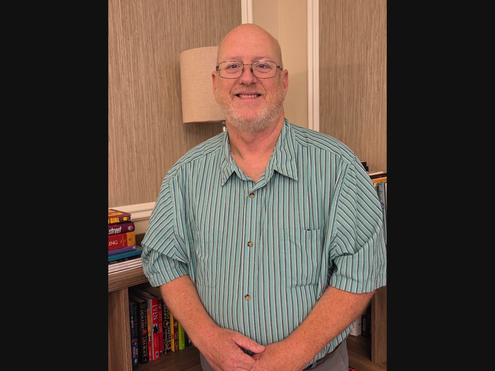 Political newcomer Christian Padgett, a Democrat, is one of two challengers looking to unseat Suffolk County Clerk Vincent Puleo in his bid for re-election on Nov. 3.