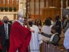 Cardinal Joseph W. Tobin greets a young parishioner on his way out of Newark’s Cathedral Basilica of the Sacred Heart on October 17 following the Archdiocese’s Opening Mass for the Church’s global Synod.