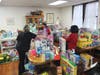 Volunteers sort through thousands of toys in search of gifts for people in need at the Archdiocese of Newark Mercy House’s annual Christmas Toy Giveaway on December 17, 2021.