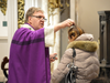 Cardinal Tobin sprinkles ashes on the head of a Catholic during an Ash Wednesday Mass at St. Patrick’s Pro-Cathedral in Newark on March 2, 2022. 