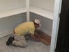 Manny Buri, The Mercy House of Jersey City’s maintenance worker, installs new flooring as part of the renovations paid for using donations from Archdiocese of Newark parishes, organizations, and individual donors.