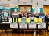Students at St. Cassian School students present projects addressing global challenges during the school’s annual STREAM Fair. 