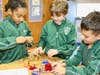 Students at St. Cassian School learn about electrical circuits as part of the school’s STREAM curriculum. 