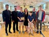 From left to right – Father Patrick Seo, Father George Joseph (pastor of Holy Trinity Parish in Westfield), Dominic Auricchio, Maria Auricchio, Maximo Auricchio, Neal Auricchio, and Vincenzo Auricchio gather at Dominic’s award ceremony.
