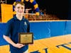 Dominic Auricchio poses with the plaque he received for winning the Cardinal Joseph Tobin Essay & Video Contest.