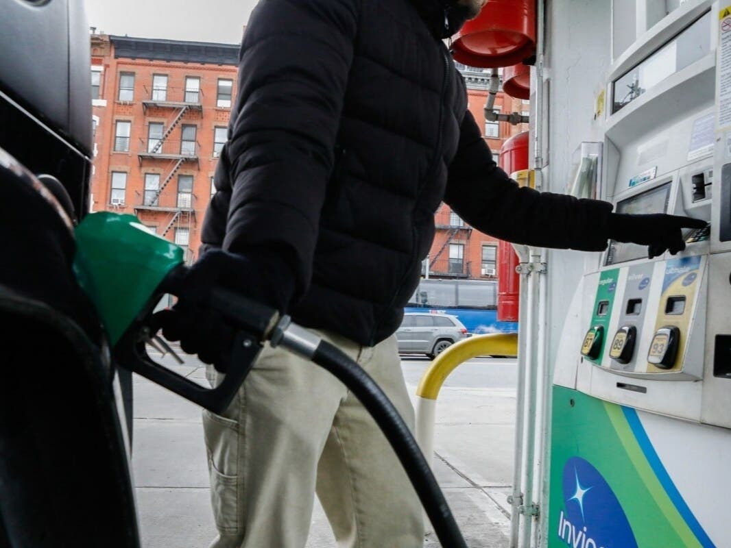 A driver pumps gas in East Harlem, Jan. 16, 2026.