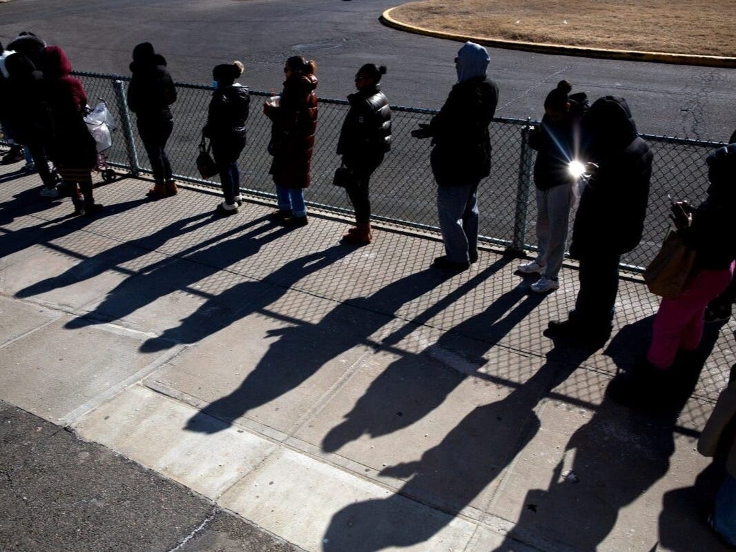 People wait in line to visit loved ones detained on Rikers Island, Feb. 5, 2025.