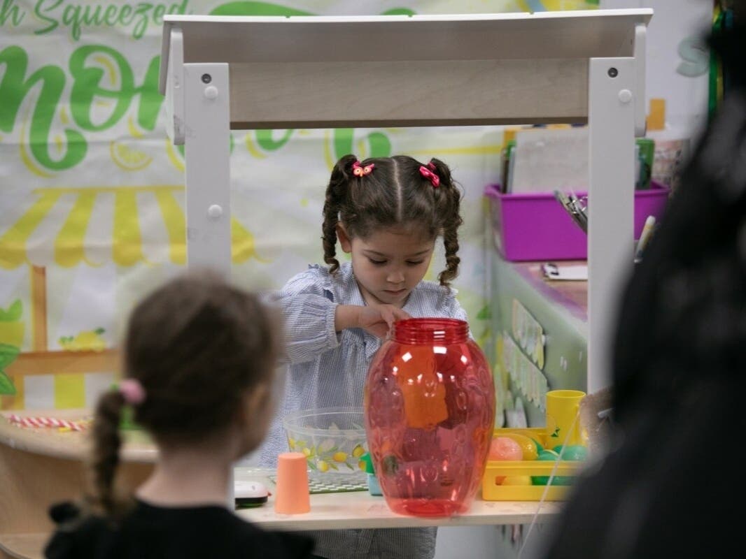 Children do arts and crafts inside an early childhood center in Midtown, May 11, 2026.