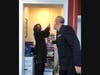 Pastor of the Presbyterian Church at Woodbury Rev. Dr. Philip Oehler assists Woodbury Mayor Peg Sickel in getting the bell started ringing