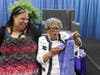 Piscataway Branch Librarian Joy Robinson presenting Dr. Opal Lee with a gift at the library's Juneteenth event June 9th.