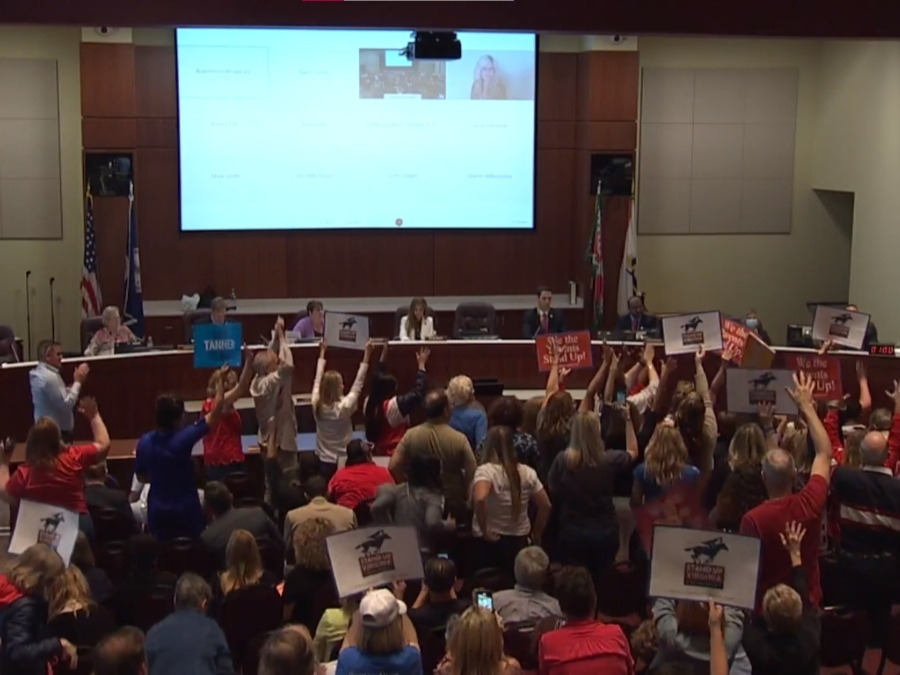 Tuesday's Loudoun County School Board meeting in Leesburg was disrupted by speakers who opposed the school district's proposed policies on transgender students, and perceived concerns about critical race theory. 