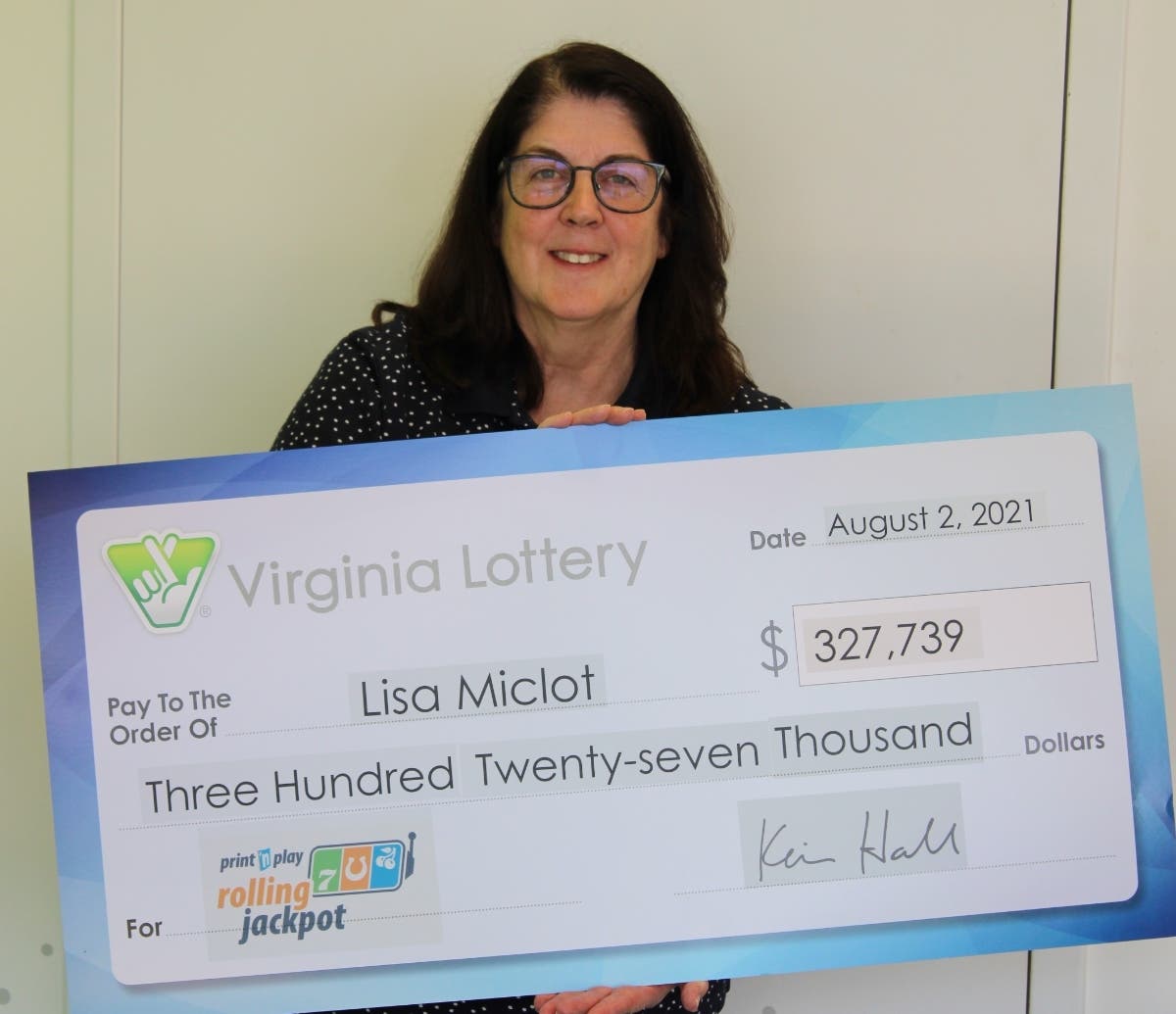 Lisa Miclot, a Catharpin resident who works in real estate, won more than $300,000 in the Virginia Lottery's Print 'n Play Rolling Jackpot game. Miclot purchased her winning ticket at the Ashburn Harris Teeter on Creek View Plaza. 