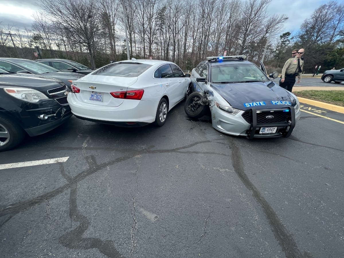Fleeing Suspects Crash Into State Trooper In Jail Parking Lot: Police ...