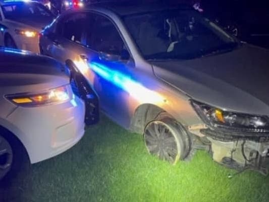 A teenager fled from police in Stafford on Saturday. One of the teen's tires disintegrated during the chase, which ended with a crash in a home's front yard. 
