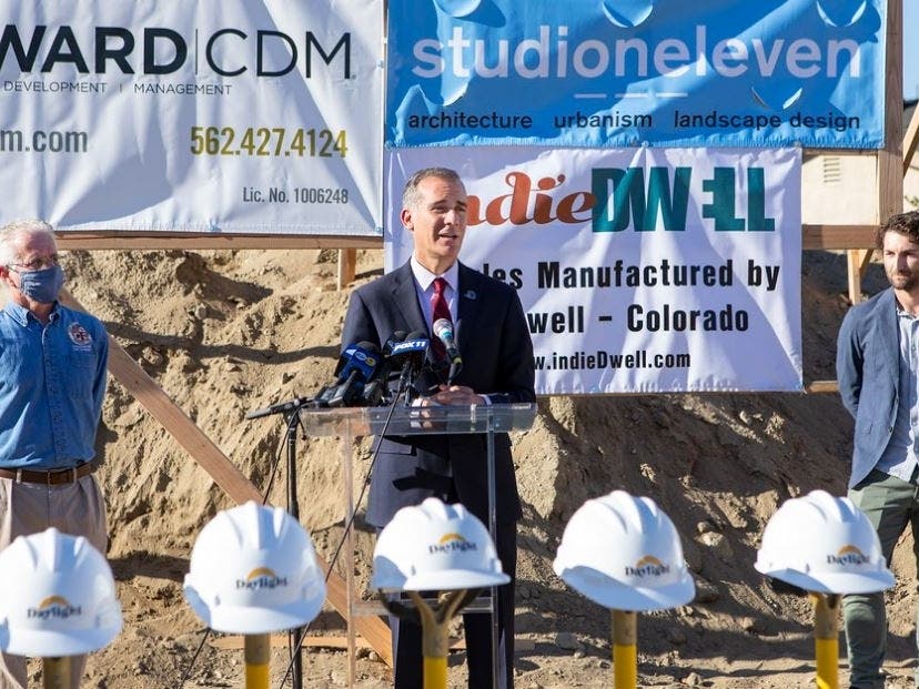 LA Mayor Eric Garcetti speaks at Thursday's groundbreaking of the Vanowen Apartments in North Hollywood. He is flanked by Councilmember Paul Krekorian, left, and Greg Comanor, partner at Daylight Community Development.