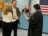District Judge Jan Vislosky swears in Falls Township Supervisor Jeffry Dence. 