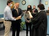 District Judge Jan Vislosky swears in Falls Township Supervisor John Palmer.