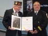 The VFW presents Levittown Fire Co. #1 firefighter Brian Huber with a national firefighter of the year award. 