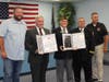 Falls Township Supervisor Jeff Boraski (left) and Supervisor John Palmer (far right) join the VFW in recognizing (second from left) Falls Township Police retired officer John Yeager and (second from right) Levittown Fire Co. #1 firefighter Brian Huber.