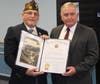 The VFW presents retired Falls Township Police officer John Yeager with a national award. 