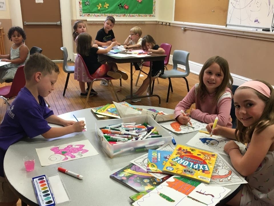 An image of children enjoying arts and crafts at Ely Chapman's Sensational Summer Camp program.