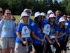 Sydney Miranda (third from left) and her “Steppin’ with Syd”teammates queue up to start the 10th Annual Viking Challenge for MG at Berens Park in Elmhurst on June 19.  Also pictured, from left, Kelly and Holly Kost of Elmhurst.