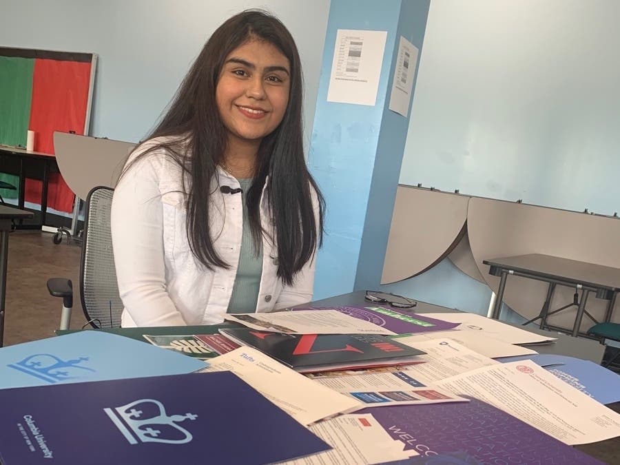 Rachel Rivera with just a few of her letters of acceptance from 17 schools.