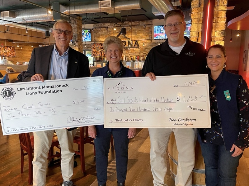 Left to right: LM Lions President Phil Oldham, Girl Scout Service Unit Manager Pat Allen, Sedona's Bill Jablonski, LM Lion and Girl Scout Troop Leader Lina Pasquale.