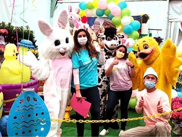 After the "egg-stravaganza" is complete, parents are invited to take photos of their children with the Easter Bunny.